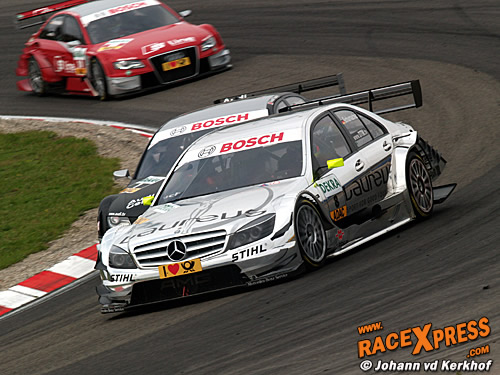 Timo Scheider in gevecht met Ralf Schumacher